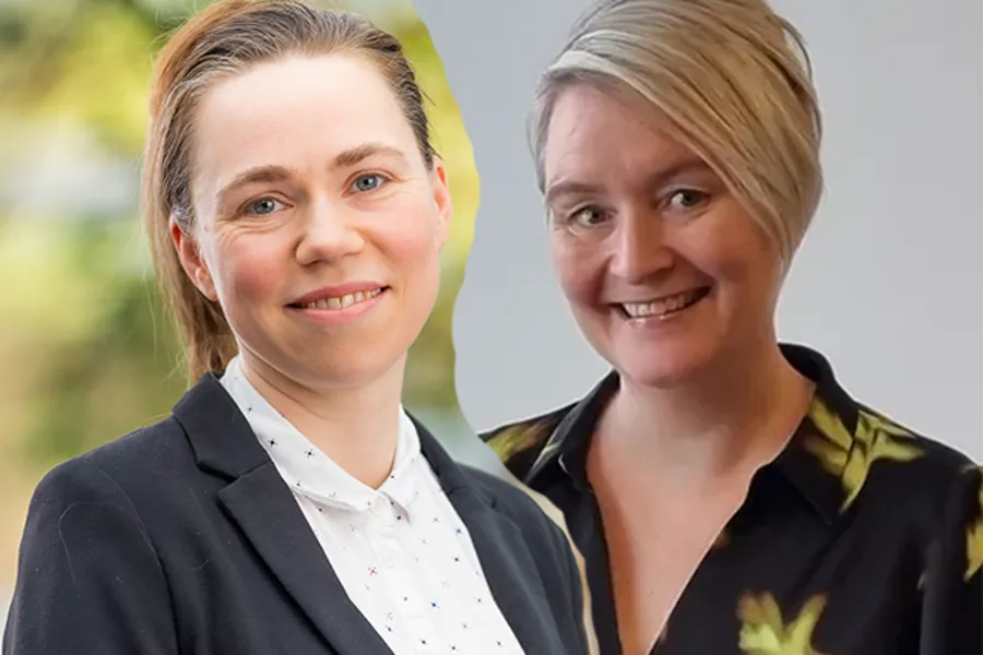 Et par kvinner som smiler